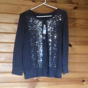 NWT beautiful sparkly cardigan.